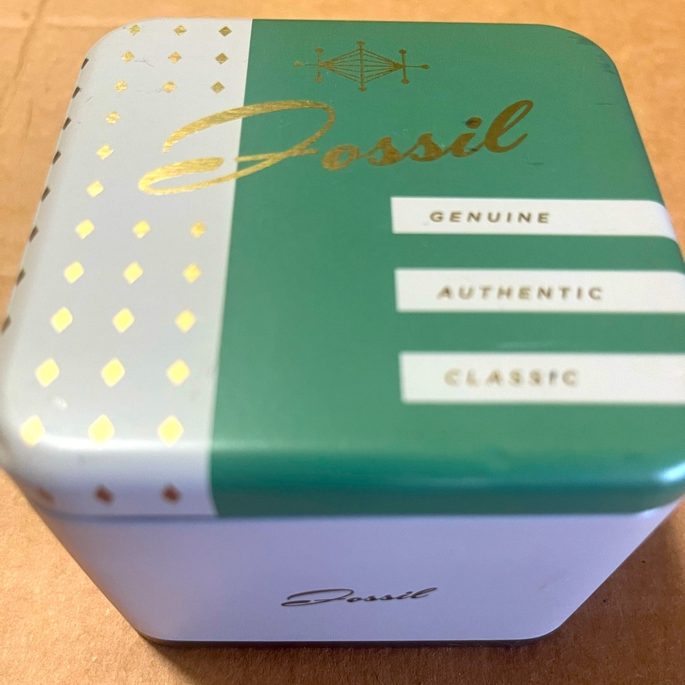 Fossil watch new with tags in original tin packaging!